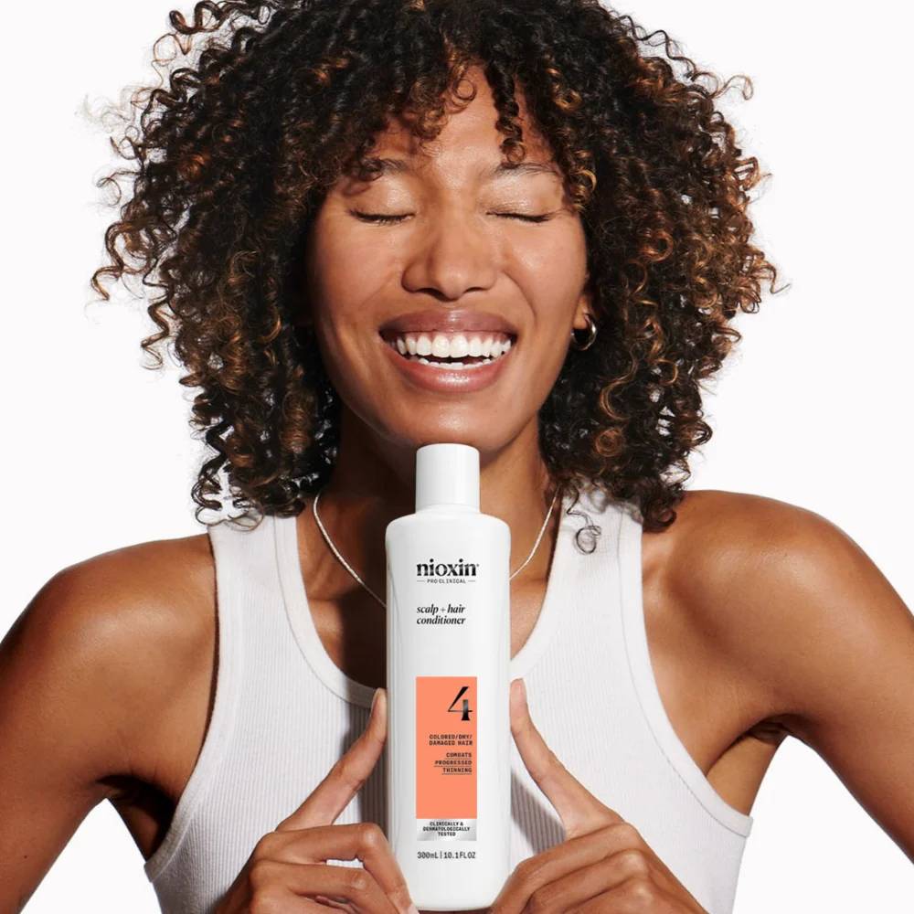Nioxin System 4 Scalp + Hair Conditioner for Progressed Thinning Coloured Hair 300ml